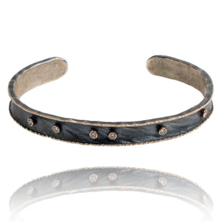 Oxidized silver stacking cuff with 14k white gold edges, 7- 2pt diamonds