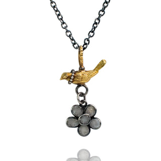 Diamond slice bird necklace in oxidized silver, 18k yellow gold