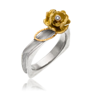 18kt yellow gold rose with a 2pt diamond on a sterling silver square band