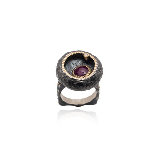 Oxidized silver ring with round pot and violet stone