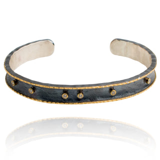 Oxidized silver cuff with 18k yellow gold edges, 7- 2pt diamonds