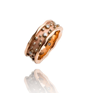 14k pink gold 7mm ring with 6-2pt diamonds set in 14k white gold