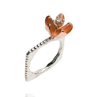 14k pink gold seed pod flower with 2pt diamond set in 14k white gold