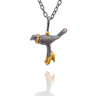 Bird with heels necklace, oxidized silver, 18k gold