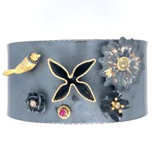 Wide cuff with bird and scattered flowers