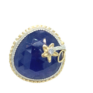 Faceted Blue Tanzanite with flower