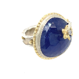 Faceted Blue Tanzanite with flower