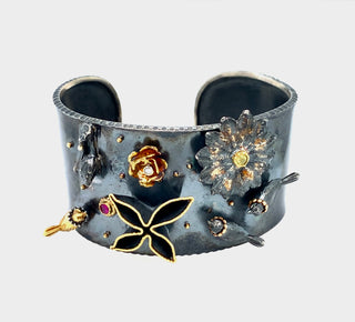 Wide cuff with bird and scattered flowers